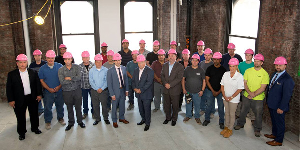 300 Forest Electric New York Construction Workers Wear Pink Hard Hats at Job Sites in October