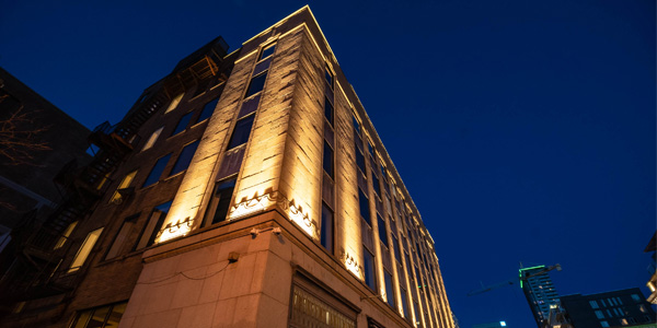 Downtown Art Deco Building Revitalized through Illumination
